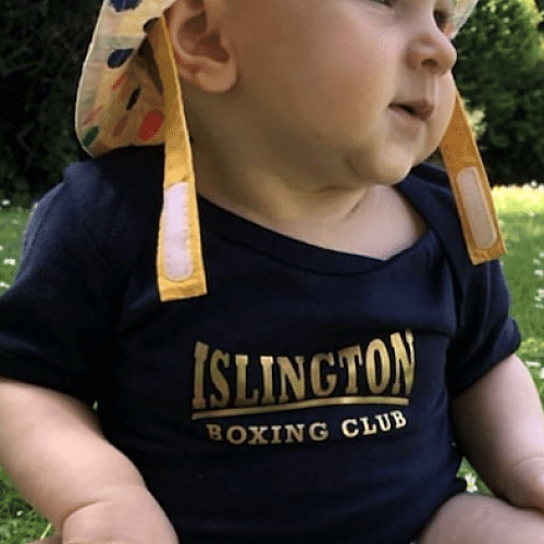 Coach Rider's Baby in a custom IBC baby grow